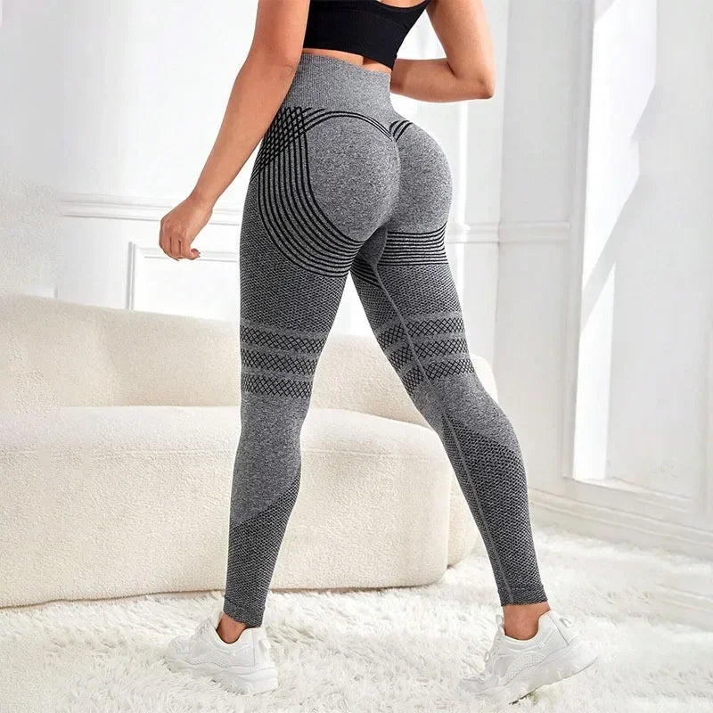 VaultHaus high waist gym tights in gray featuring a flattering design and stretchy material for workouts