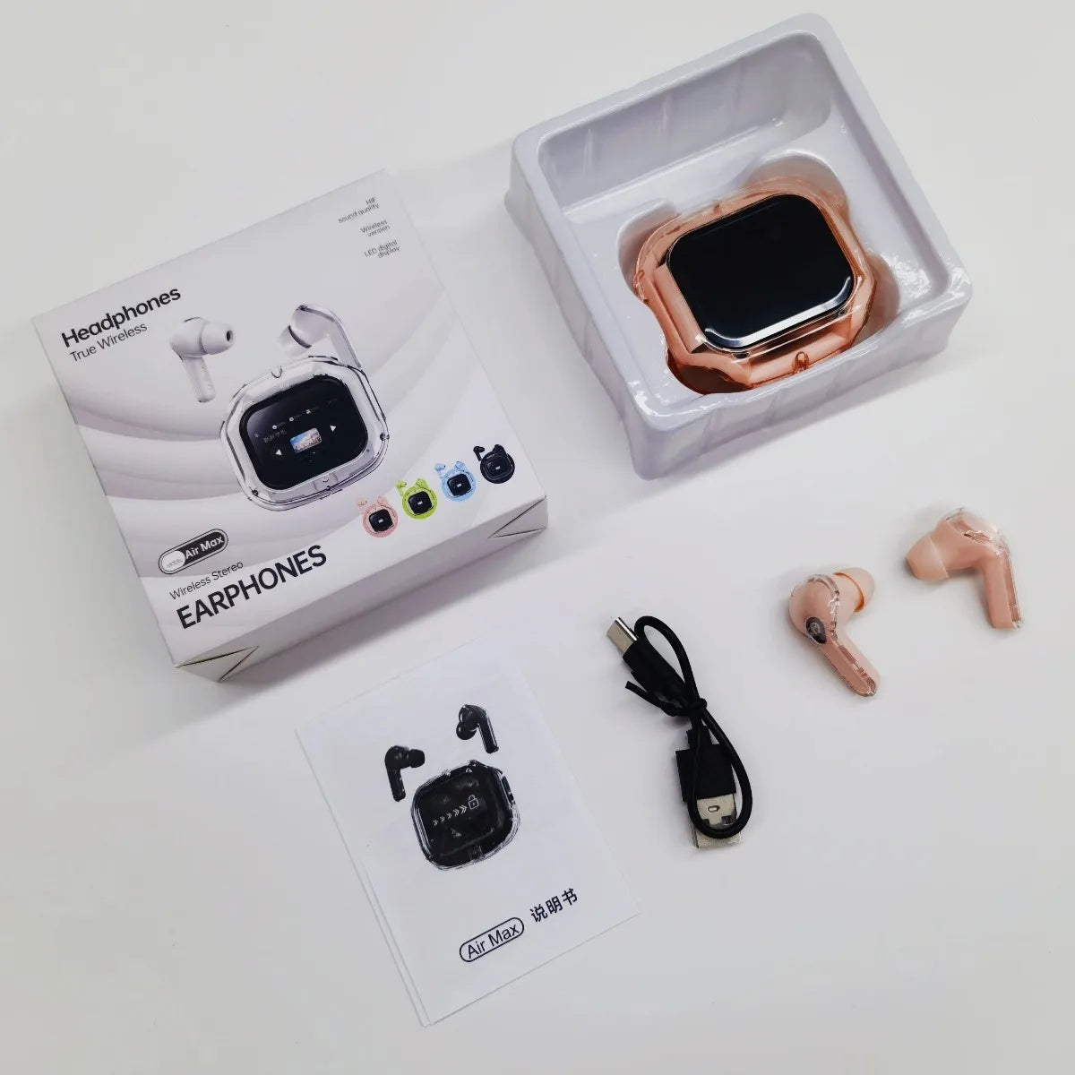 VaultHaus translation headphones with touch screen in rose gold with charging cable and user manual