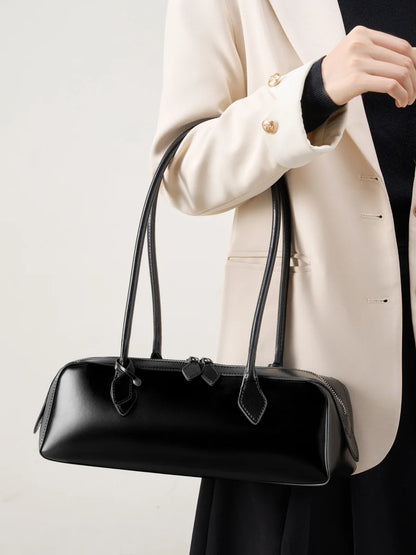 Stylish black ladies baguette shoulder bag with elegant handles for a chic look
