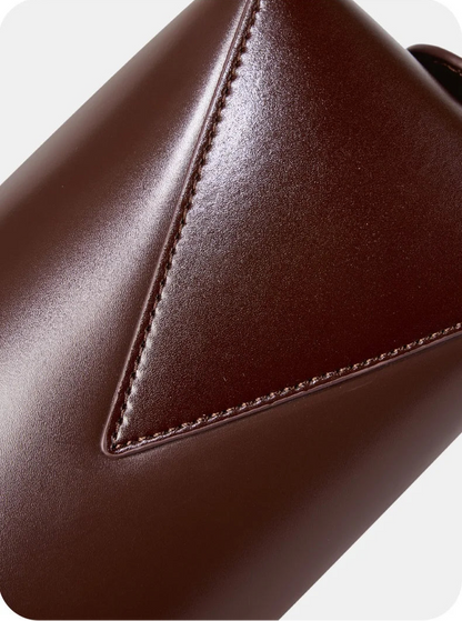 Stylish brown ladies baguette shoulder bag with a sleek design and versatile functionality