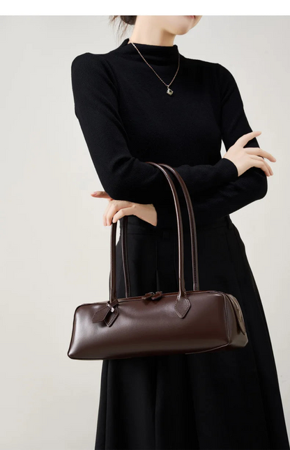 Stylish ladies baguette shoulder bag in dark brown, perfect for versatile outfits and everyday use