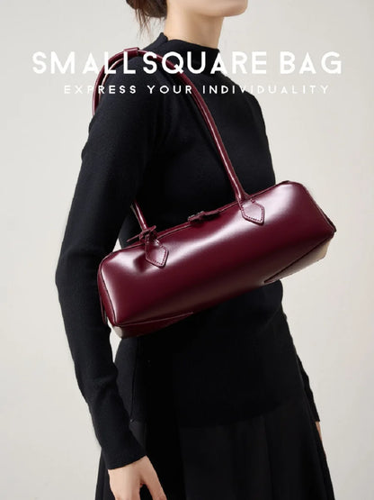 Stylish ladies baguette shoulder bag in burgundy for chic outfits and everyday use
