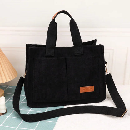 VaultHaus large capacity canvas handbag in black with stylish design and adjustable strap