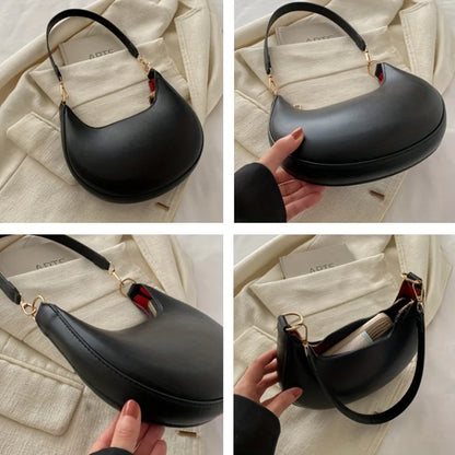 VaultHaus luxury moon-shaped handbag in black with a sleek design and stylish strap