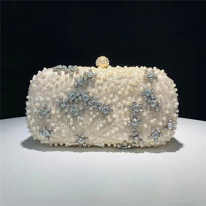 VaultHaus pearl embellished evening clutch bag with intricate bead and crystal detailing on white fabric