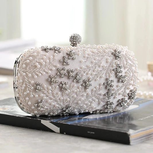 VaultHaus pearl embellished evening clutch bag with intricate bead and crystal detailing on a soft fabric