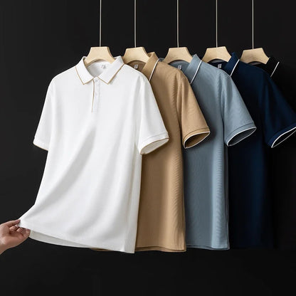 VaultHaus men's business casual polo shirt collection in various colors hanging on display
