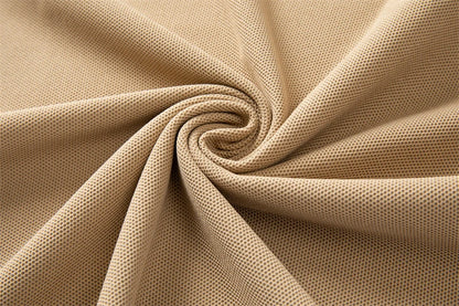 Soft beige fabric suitable for men's business casual polo shirt with a smooth texture
