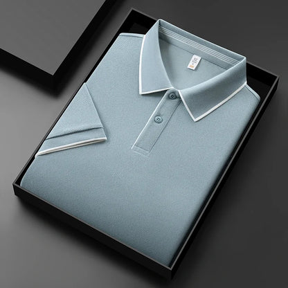 Men's business casual polo shirt in light blue, neatly folded in a black gift box