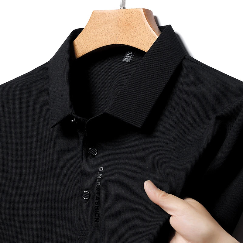Solid color polo shirt for men in black with a classic collar and stylish button details