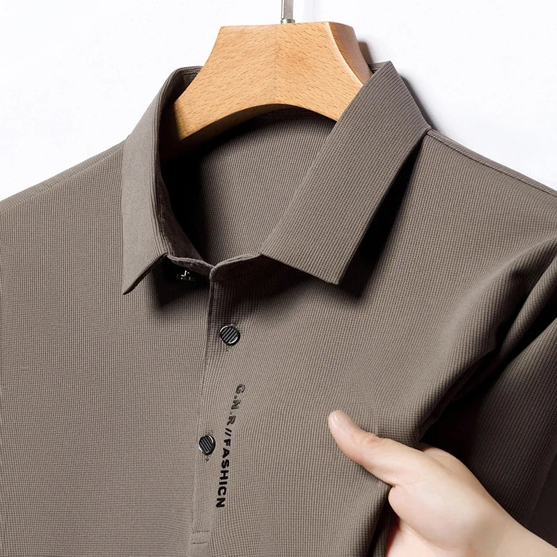 VaultHaus solid color polo shirt for men in gray with a classic collar design