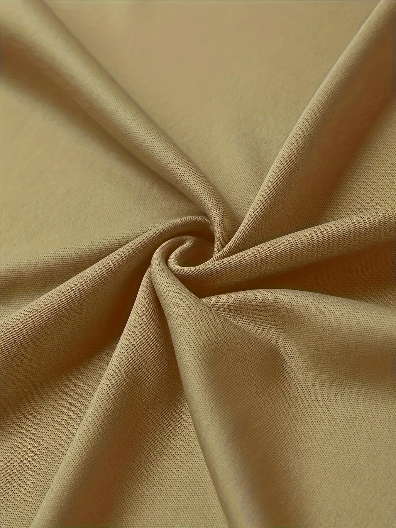 Close-up of soft fabric showcasing the quality of the men's cotton compass t-shirt in beige color