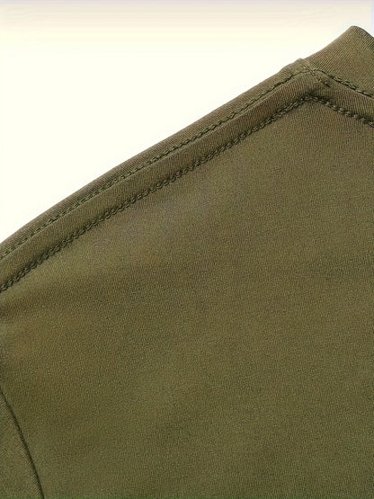Close-up of the shoulder seam on a men's cotton compass t-shirt from VaultHaus in olive green