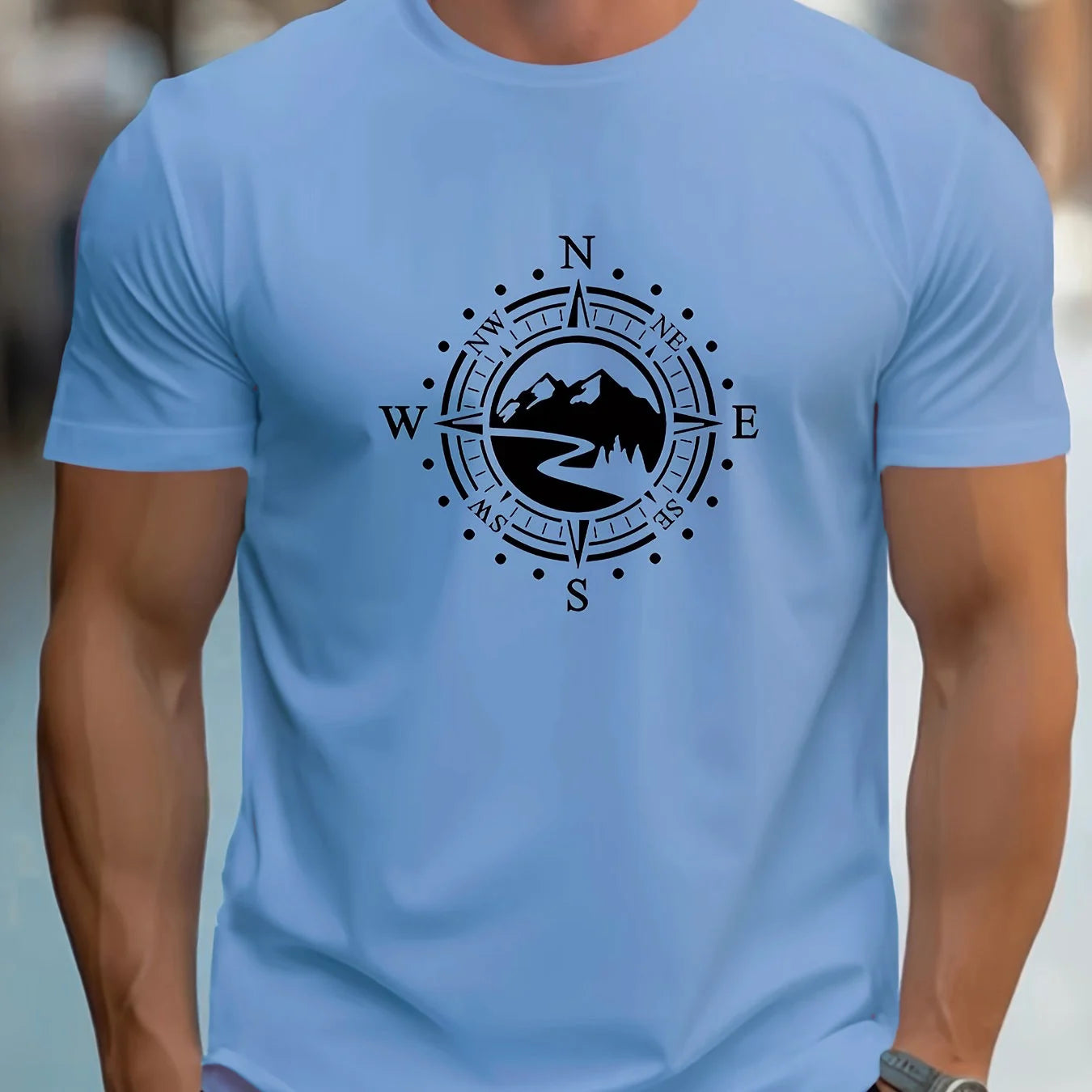 Men's cotton compass t-shirt in light blue featuring a compass graphic design
