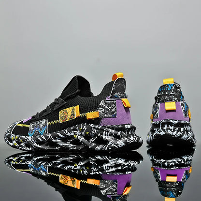 VaultHaus men's luxury sneakers in black with colorful patchwork and bold patterned sole