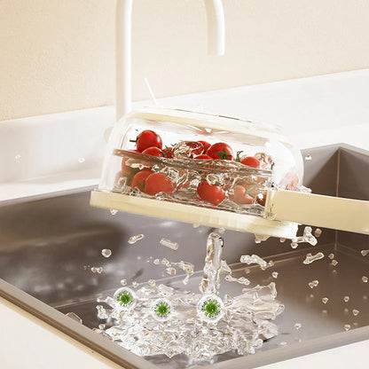 VaultHaus multi-function fruit and vegetable strainer basket rinsing cherry tomatoes over kitchen sink