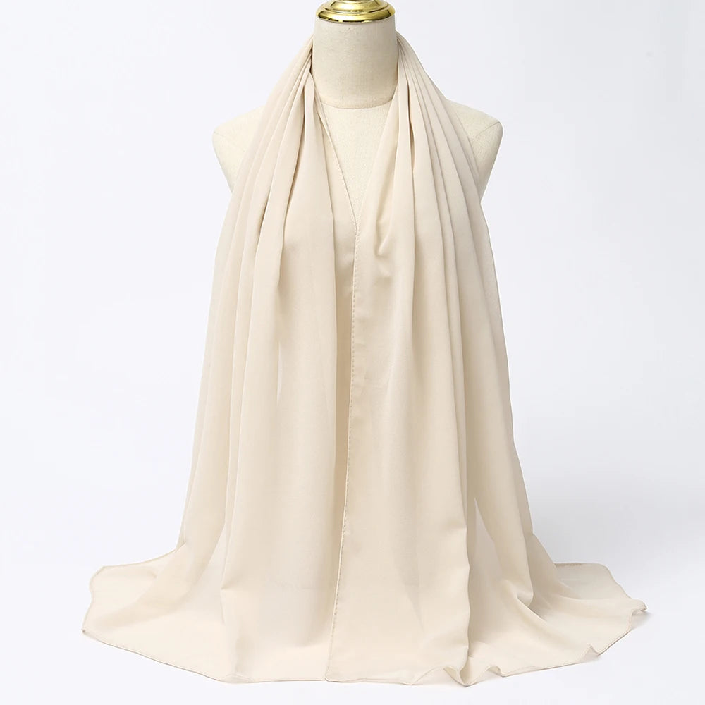 Elegant Cream Muslim Chiffon Hijab Scarf Draped on a Mannequin for Modest Fashion