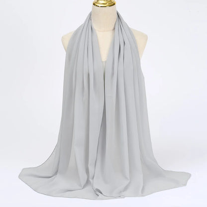 Elegant grey muslim chiffon hijab scarf made from lightweight, breathable fabric for stylish coverage