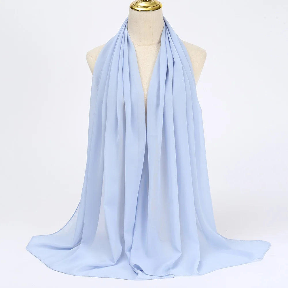 Light blue muslim chiffon hijab scarf draped elegantly for stylish and modest wear