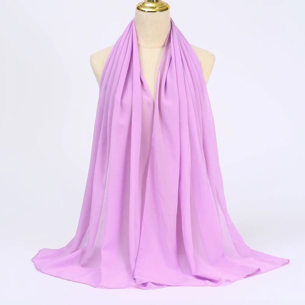 Lavender Muslim chiffon hijab scarf draped elegantly on a mannequin for stylish layering