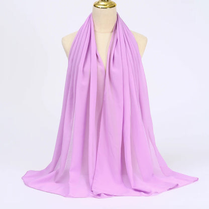 Lavender Muslim chiffon hijab scarf draped elegantly on a mannequin for stylish layering