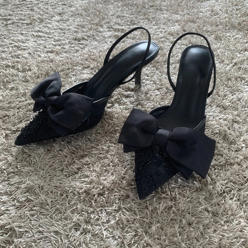 Elegant black mesh embroidered high heels with bow for stylish evening wear
