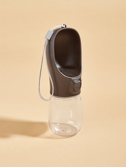 VaultHaus portable dog water bottle with black upper drinking tray and clear water reservoir