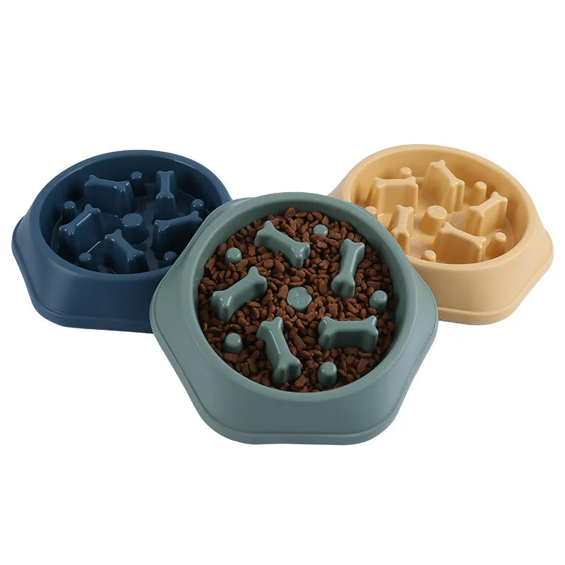 Three VaultHaus slow feeder Anti-choking dog bowls in different colors for safe and controlled feeding