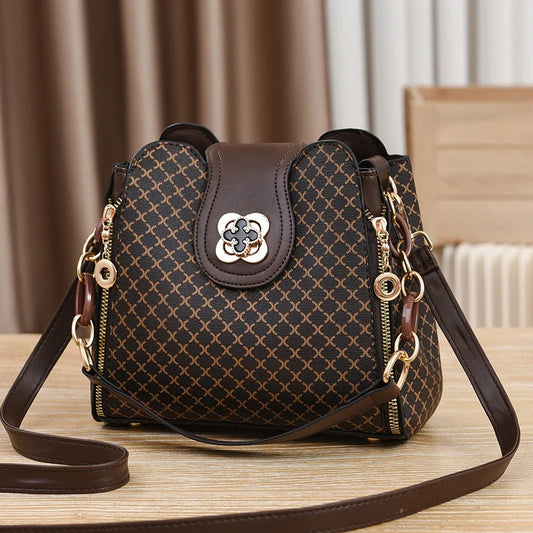 Stylish Leather Crossbody Handbag with gold accents and adjustable strap for everyday use