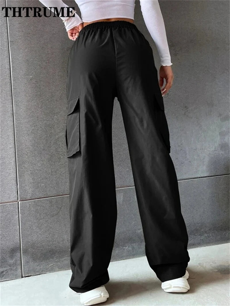 Black vintage streetwear cargo pants with elastic waistband and side pockets for relaxed fit