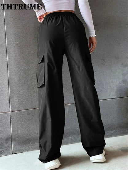 Black vintage streetwear cargo pants with elastic waistband and side pockets for relaxed fit