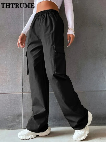 Black vintage streetwear cargo pants with an elastic waistband and side pockets for comfort and style