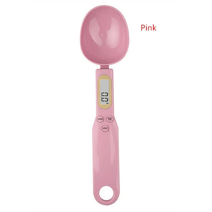 Mini electronic spoon scale in pink for precise food measuring, perfect for flour, milk, and coffee.