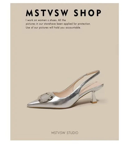 Silver elegant slingback shoes with pointed toe and decorative buckle detail