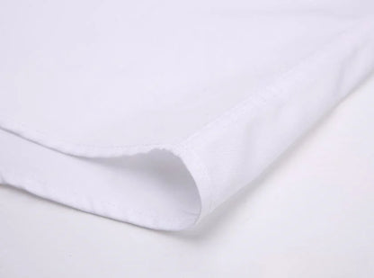 Close-up of a white long sleeve anti-wrinkle office shirt with smooth fabric for professional wear