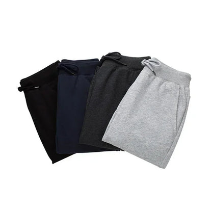 Variety of VaultHaus soft fitness sweatpants 2025 in black, navy, gray, and dark gray colors stacked together
