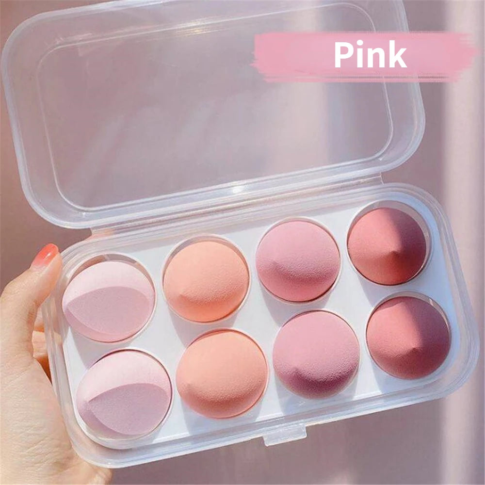 Pink soft makeup sponge set in clear case with eight sponges for blending and applying cosmetics