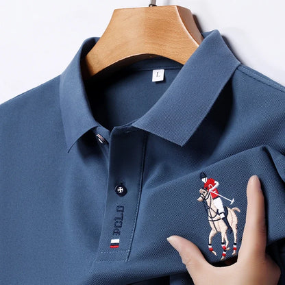 Stylish men's embroidered polo in blue with a horse logo on the chest for a refined casual look