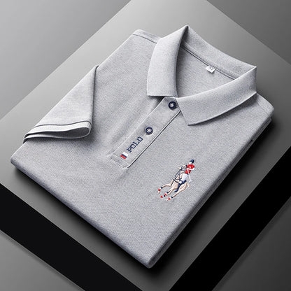 Stylish men's embroidered polo in gray featuring a classic collar and detailed logo
