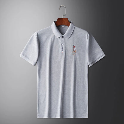 VaultHaus stylish men's embroidered polo in light gray with detailed logo design on chest