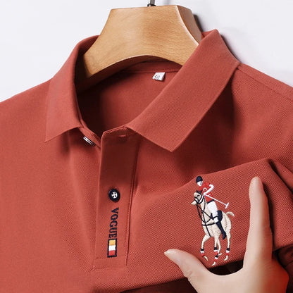Stylish men's embroidered polo in rust color with a horse design on the chest pocket