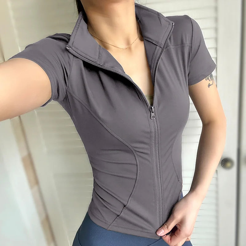 VaultHaus women's summer waist slimming yoga top in gray with zippered front and fitted design