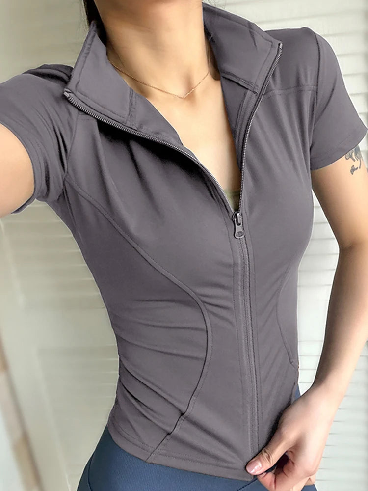 VaultHaus women's summer waist slimming yoga top in gray with zip front and fitted design