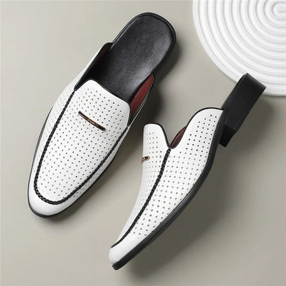 VaultHaus breathable patent leather mules in white with black sole and perforated design