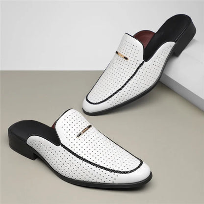 VaultHaus breathable patent leather mules in white with black sole and perforated design.