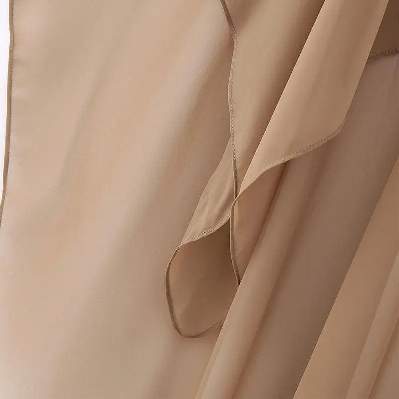Elegant women's chiffon overlay cape in soft beige, perfect for layering and enhancing outfits