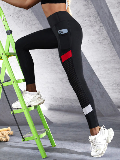 Women's colorblocked mesh leggings with side pocket, perfect for workouts and everyday wear