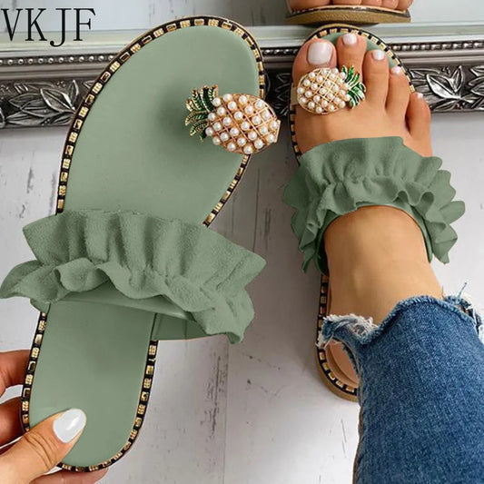 Stylish women's flat toe sandals with ruffled design and pineapple embellishment