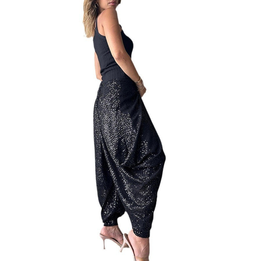 Stylish women's sequin harem pants in black, perfect for parties and casual outings