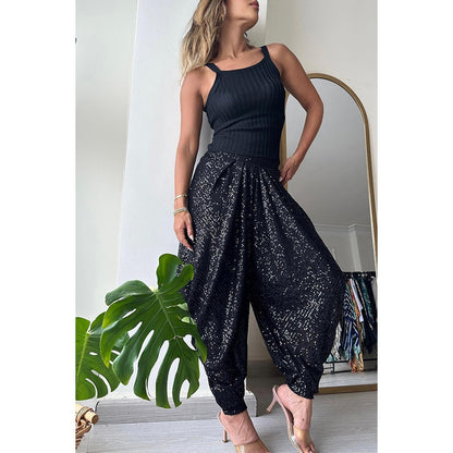 Trendy women's sequin harem pants with a stylish fit, perfect for a chic evening look